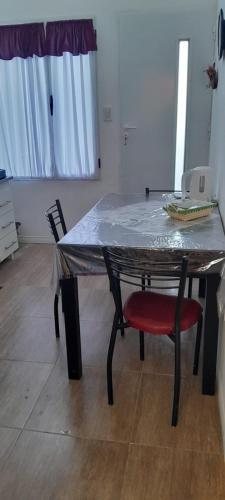 a table with a plastic sheet on top of it at Freedom GALLE in Río Gallegos