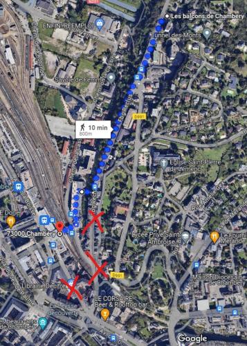 a map with two red arrows on a road at Les Balcons de Chambéry in Chambéry