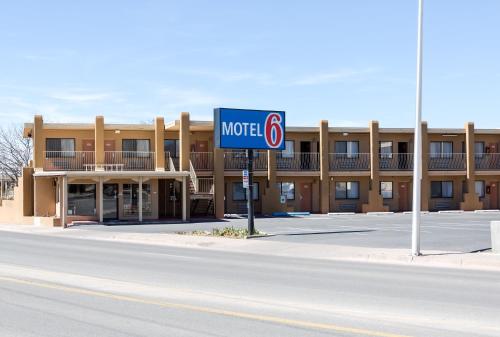 a motel sign in front of a building at Motel 6-Santa Fe, NM - Downtown in Santa Fe