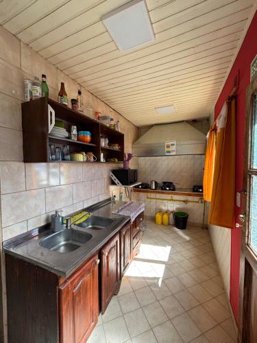 Kuchyň nebo kuchyňský kout v ubytování Hostal Leolei