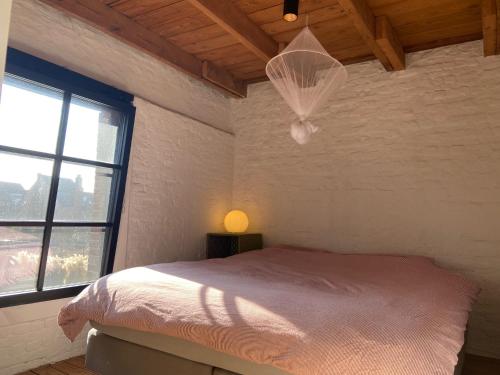 Postel nebo postele na pokoji v ubytování Cosy house 5 people