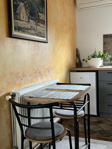 O bucătărie sau chicinetă la Duna - Panonia Apartments