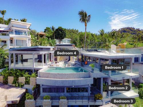 an aerial view of a mansion with descriptions of the house at Paradise Villa Elysium - Sea View Infinity Pool with Waterfall & Jacuzzi in Koh Samui 