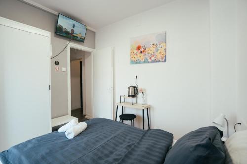 Krevet ili kreveti u jedinici u objektu Studio Apartment & Rooms Huang
