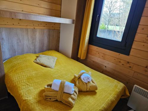 Giường trong phòng chung tại Les terrasses des bouleaux Gîtes et Chalets SPA