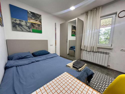 Postel nebo postele na pokoji v ubytování Clara Studios