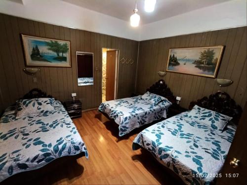 Postel nebo postele na pokoji v ubytování Hotel Di Maurier