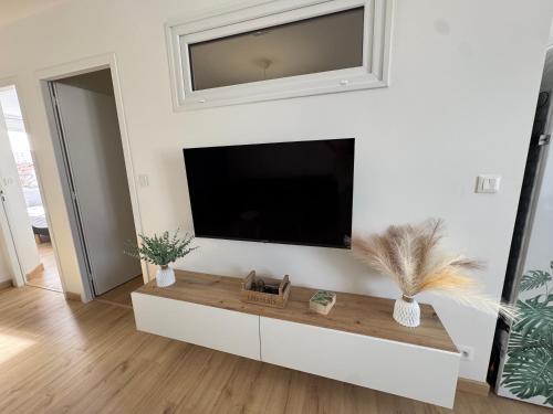 TV/trung tâm giải trí tại La playa, refait a neuf, proximité plage, parking