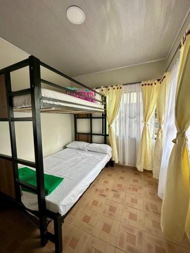 Postel nebo postele na pokoji v ubytování Finca Anapoima - Villa Paty