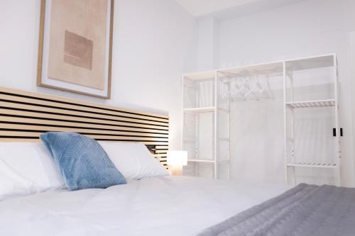 Ένα ή περισσότερα κρεβάτια σε δωμάτιο στο Apartamentos Yakka
