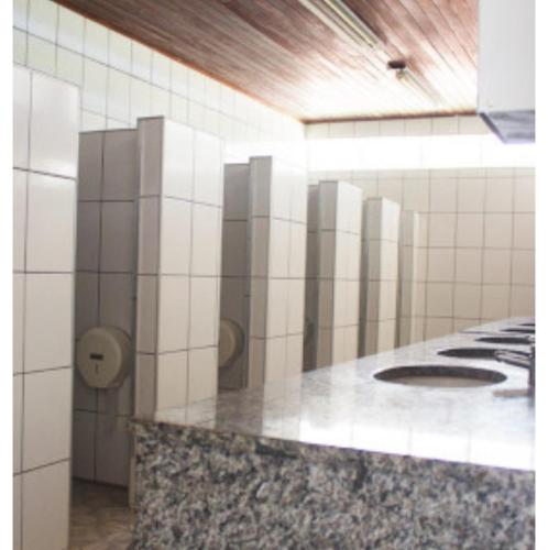 a tiled kitchen with a counter in a room at Chale ITU- Camping Carrion -Tomorrowland 2 in Itu
