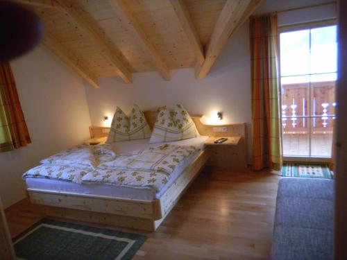 Ένα ή περισσότερα κρεβάτια σε δωμάτιο στο Ferienhaus Longa