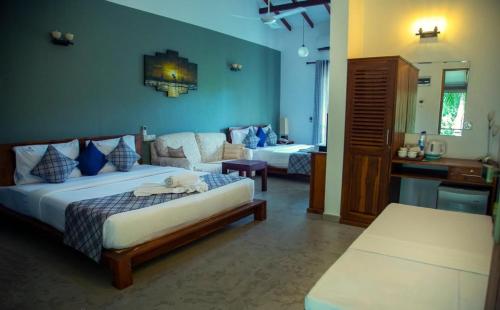 Ein Bett oder Betten in einem Zimmer der Unterkunft Hotel Heladiv