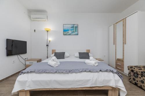 Postel nebo postele na pokoji v ubytování Apartment Zdravka