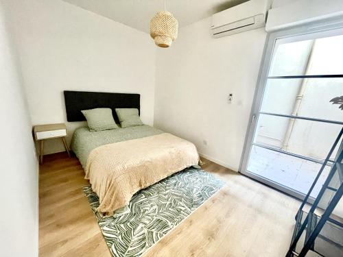 Ένα ή περισσότερα κρεβάτια σε δωμάτιο στο Le Petit Luberon WiFi Fibre