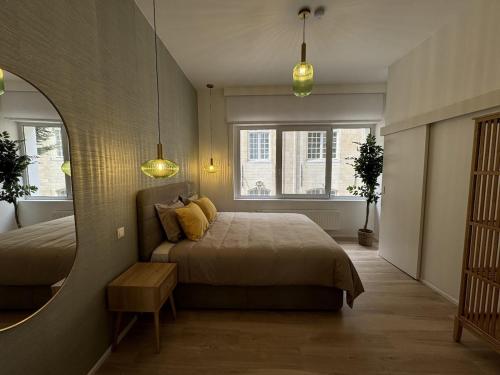 Postel nebo postele na pokoji v ubytování Luxury Suites Royal by Rikas Hotels