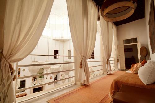 Voodi või voodid majutusasutuse Riad de charme toas