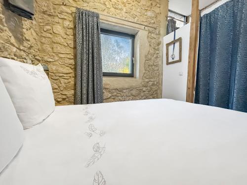 Postel nebo postele na pokoji v ubytování Gîte Aznavour près de Carcassonne