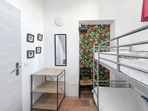 Postel nebo postele na pokoji v ubytování Gîte Aznavour près de Carcassonne