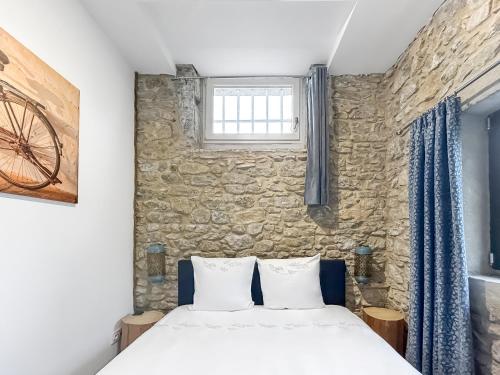 Postel nebo postele na pokoji v ubytování Gîte Aznavour près de Carcassonne