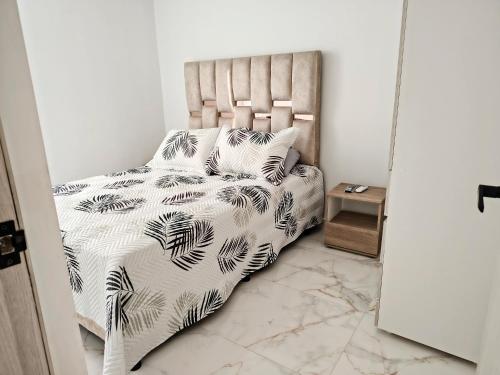 Postel nebo postele na pokoji v ubytování Apartamento en Girón sector colonial cerca del Aeropuerto