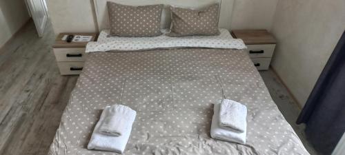 Postel nebo postele na pokoji v ubytování Apartament Salvo