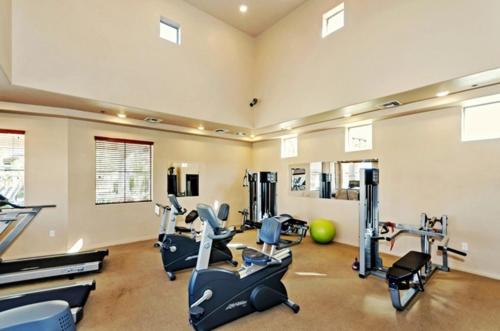 a gym with several exercise bikes in a room at Southern #2055 Mesa in Mesa