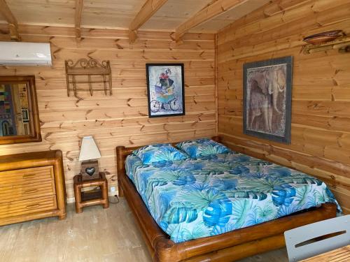 Postel nebo postele na pokoji v ubytování Cabane bambou