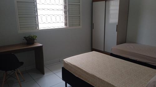 Postel nebo postele na pokoji v ubytování Refúgio Hostel Unidade 2