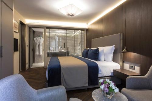 Postel nebo postele na pokoji v ubytování Noble22 Suites-Special Category