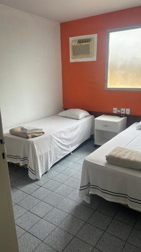 Кровать или кровати в номере Itajubá Classic Setor Central Goiânia
