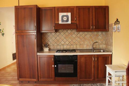 Η κουζίνα ή μικρή κουζίνα στο A CASA di ROMOLO