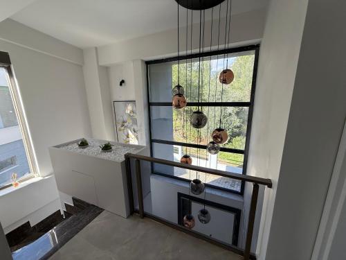 a room with a window and a staircase with a window at Canyon Villa Göynük Kemer Antalya with Pool in Antalya