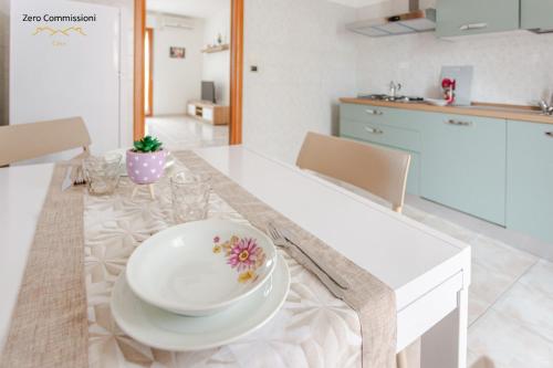 Kuchyň nebo kuchyňský kout v ubytování Casa Pandolfi, appartamento 90mq con posto auto e aria condizionata