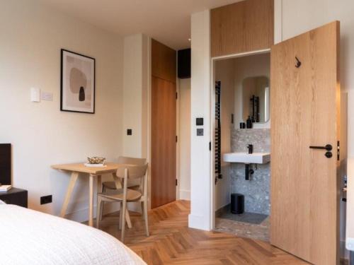 Ένα ή περισσότερα κρεβάτια σε δωμάτιο στο Central London Ensuite, Exclusive Experiences