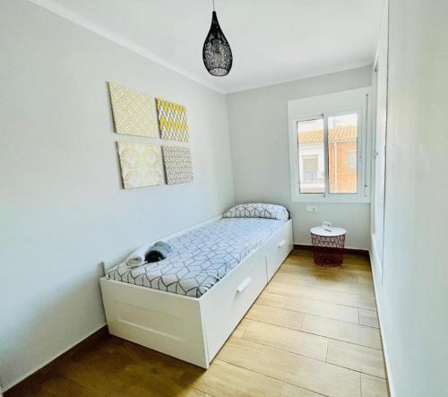 En eller flere senge i et værelse på Casita Pescadores