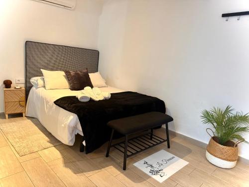 Ένα ή περισσότερα κρεβάτια σε δωμάτιο στο La Faraona