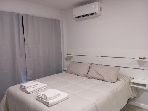 Postel nebo postele na pokoji v ubytování Moderno monoambiente a estrenar, Totalmente equipado, Inmejorable ubicacion