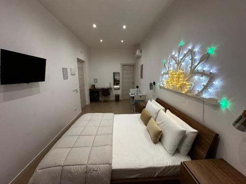 TV a/nebo společenská místnost v ubytování Terra d'amuri Rooms