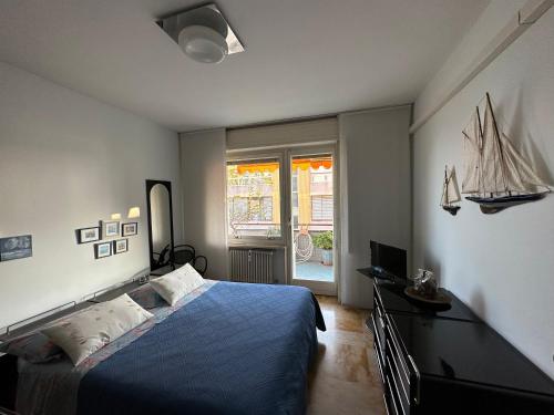 Кровать или кровати в номере Tre Ponti Beach Apartment - Terrazzo vista Mare