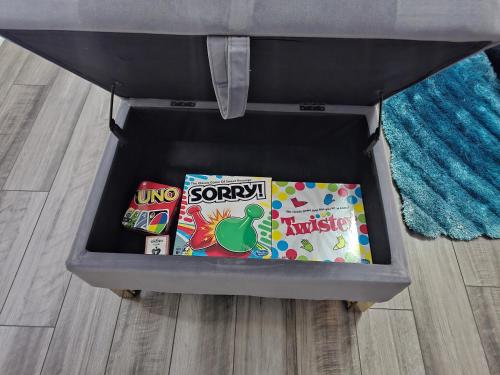 a suitcase full of snacks on the floor at Cozy 5 bedroom and 4 bathroom in Brownsburg