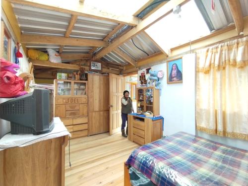 Postel nebo postele na pokoji v ubytování Casa Pájaro Azul - Isinliví