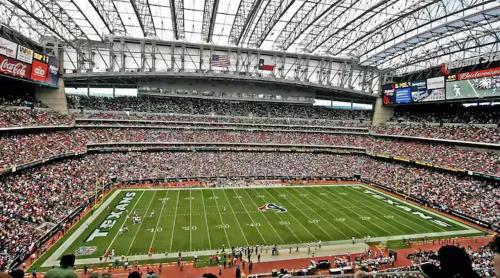 a crowd of people in a stadium watching a football game at Lé Luxe Maison -3BR 2 BA- Medical Center and Downtown HTX in Houston