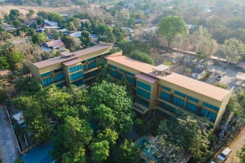 an overhead view of a building with trees at TREX Buriram Boutique Hotel in Buriram