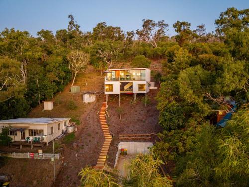 an aerial view of a house in the woods at Cantilever House - Town of 1770 in Seventeen Seventy