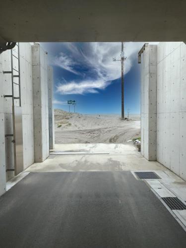 an open road in the middle of the desert at ビーチまで徒歩5分 BBQ無料 7名迄OK 戸建て貸切宿 Bignet villa in Miyamae