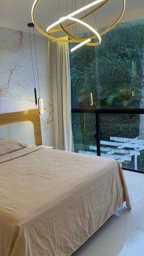 Katil atau katil-katil dalam bilik di Casa de LUXO COM PISCINA RIO DE JANEIRO