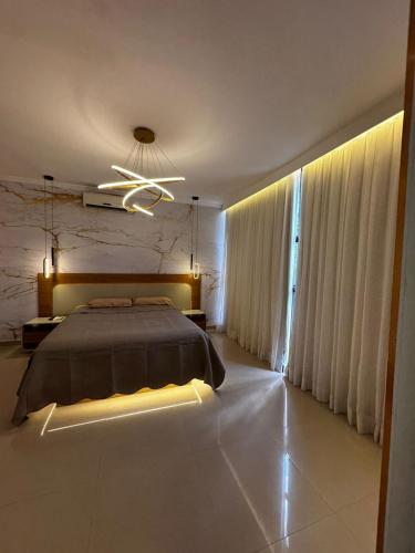 Katil atau katil-katil dalam bilik di Casa de LUXO COM PISCINA RIO DE JANEIRO