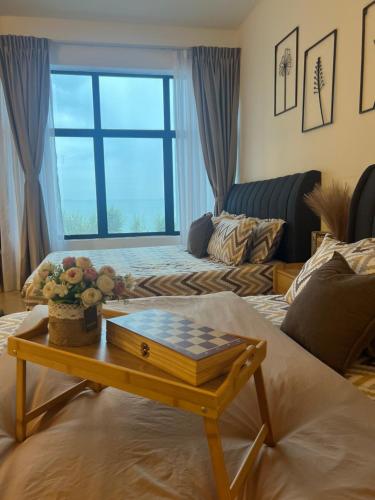 Posezení v ubytování Mutiara Melaka Beach Resort by Syiffa