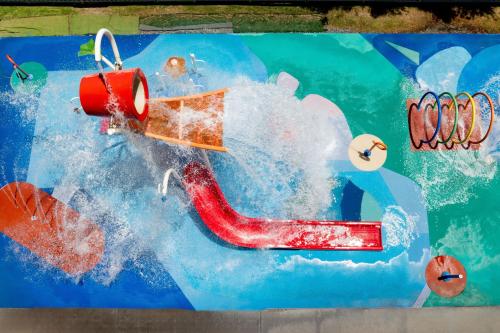 a sign for a water slide in a pool at BIG4 Swan Hill in Swan Hill